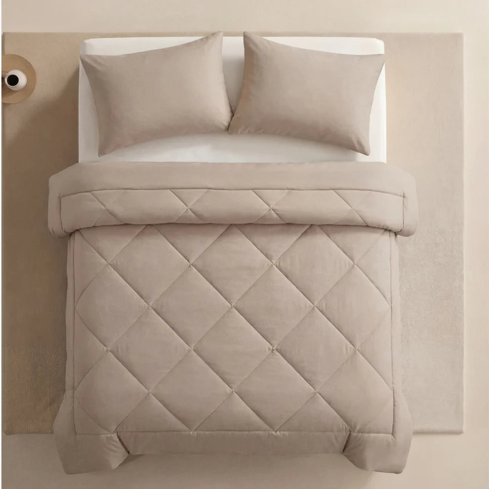 CozyFit – La couette 2-en-1 à séchage rapide qui rend le linge de lit inutile.