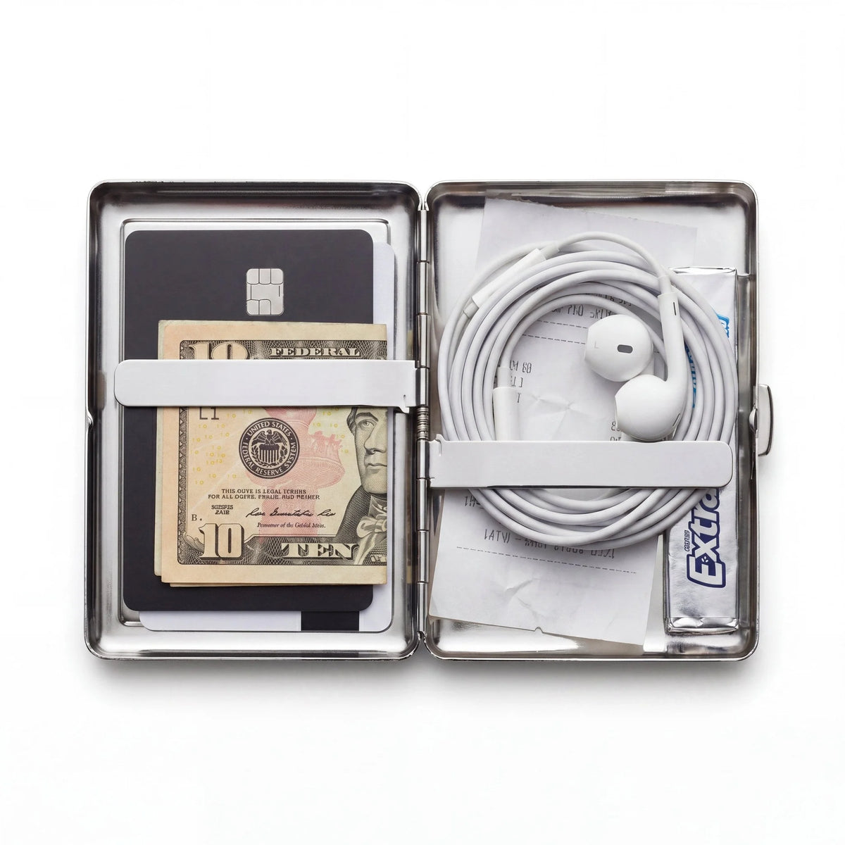 Porte-cartes en métal ArtCase ouvert, avec les essentiels à l'intérieur