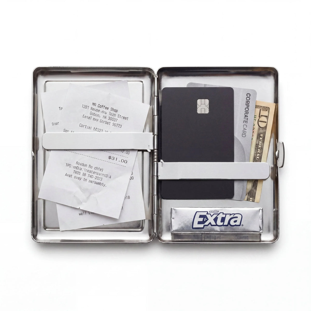 Porte-cartes en métal ArtCase ouvert, avec les essentiels à l'intérieur