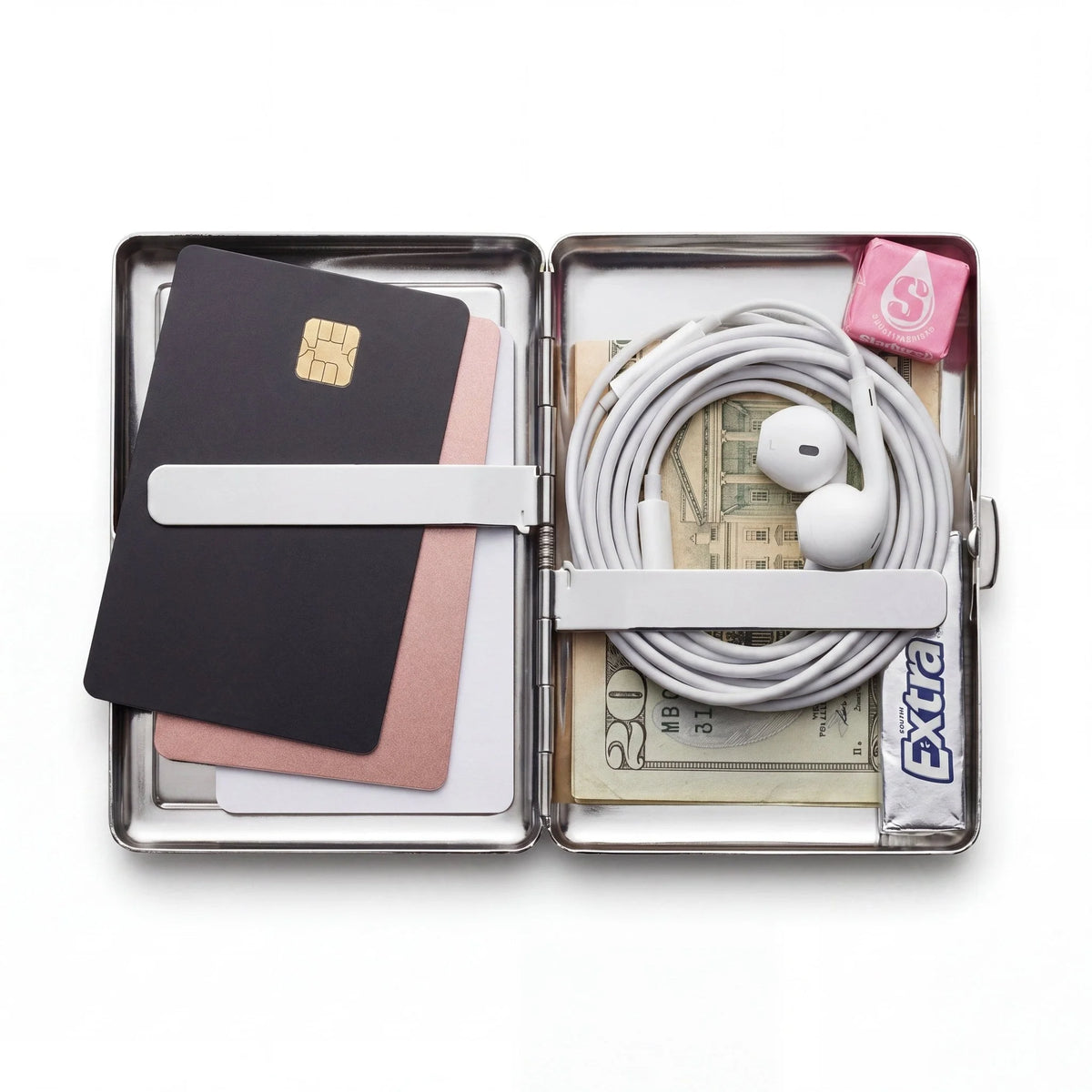 Porte-cartes en métal ArtCase ouvert, avec les essentiels à l'intérieur